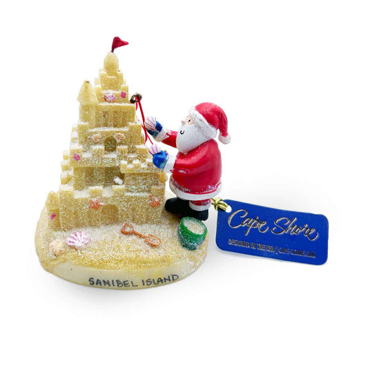 Santa Building a Sand Castle Christmas Ornament